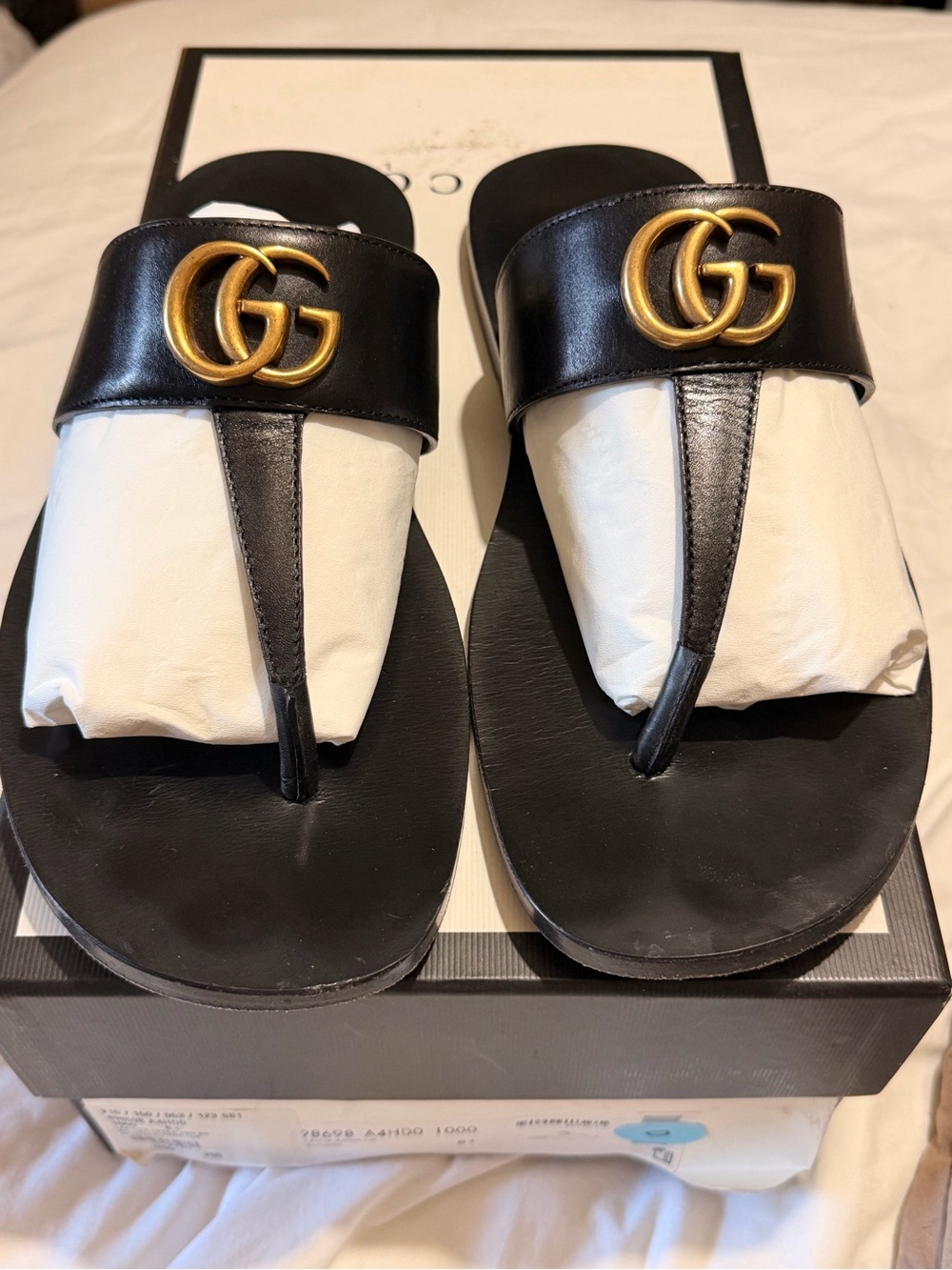 Gucci Black Leather Thong Sandals with Gold GG Emblem